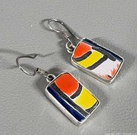 Front view showing enamel design and overall style of earrings