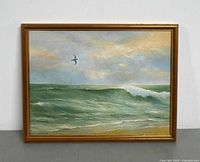 Full view of framed seascape painting