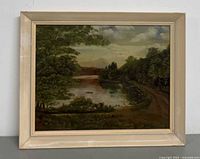 Front view of framed landscape oil painting