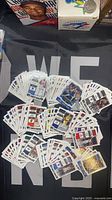 Stacks and spread of Season Ticket cards showing volume and variety