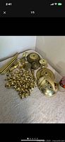 Group shot showing all brass hardware items