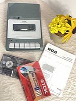 Recorder, two TDK tapes, manual grouped on surface