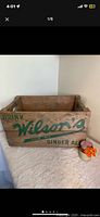 Overall view of Wilson's wooden crate front lettering
