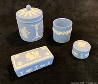 Group shot of all four Wedgwood blue jasperware pieces