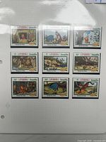 Album page showing nine Anguilla Winnie the Pooh stamps