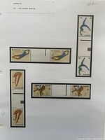 Album page showing all stamps: gutter pairs and singles