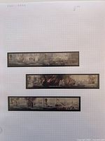 All three horizontal strips of Trafalgar commemorative stamps mounted on grid paper