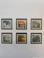 Six mounted Christmas stamps, overall view