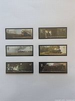 All six stamps laid out on grid paper