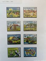 Full album page with eight Grenada Disney stamps