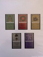 All five Isle of Man Christmas stamps on album page