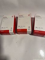 Three boxed Bontrager bicycle tubes aligned front view