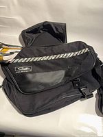 Overall view of pair of Coldwave saddle bags with tags