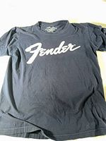 Front view of navy Fender logo t-shirt