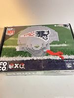 Front of FOCO BRXLZ Patriots helmet puzzle box