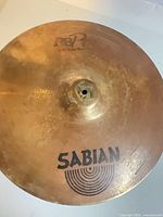Top view of Sabian B8 Pro cymbal showing logo, patina, and centre hole