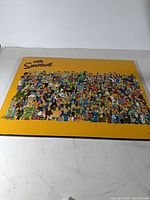 Full view of The Simpsons plaque on yellow background
