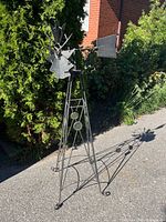 Full view of metal windmill front angle