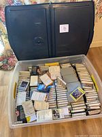 overview of bin with numerous cassette tapes