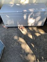 Front view of Lifetime resin deck box showing overall size and color