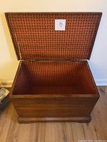 Chest with lid open showing patterned lining