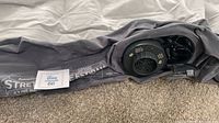 Full view of grey queen air mattress with built-in pump area visible