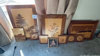 Group shot of all framed wooden marquetry pictures and floral print