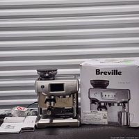 Espresso machine with portafilter, manuals and box