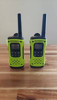 Front view of two Motorola T600 radios standing upright