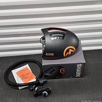 Pump, hose, adapters, manual and box displayed together