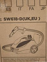 Box graphic showing steam cleaner illustration and model SW618-D