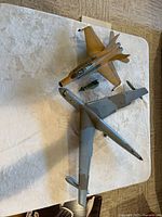 Top view of both aircraft and missile on table