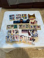 Overview of cards, pucks, stand, box and mini jersey