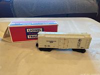 Lionel white refrigerator car with original box side view