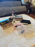 Overview of all HO scale train accessories on table