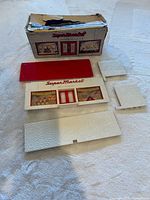 All kit components laid out beside original box