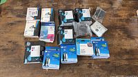Assorted sealed ink cartridges displayed on table