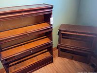 Left unit three-section barrister bookcase and two single sections