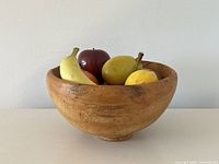 Full view of burl wood bowl with fruit
