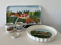Overall lot: tray, quiche dish, two mugs, small trinket box
