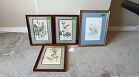 All four framed prints displayed together