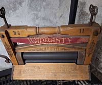 Front view showing full wringer, graphics, rollers, clamps