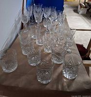 Entire grouping of tumblers and stemware on table