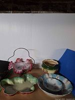 Group shot of all glass and ceramic pieces on table