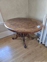 Full view of oval burl-top table