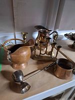 Group shot of all metal pieces on table