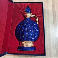 Decanter lying in red-lined case