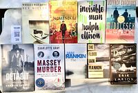 Front covers of all eight books displayed side-by-side