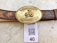 Full view of belt with buckle showing size tag