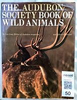 Front cover of hardcover dust jacket showing title and deer image